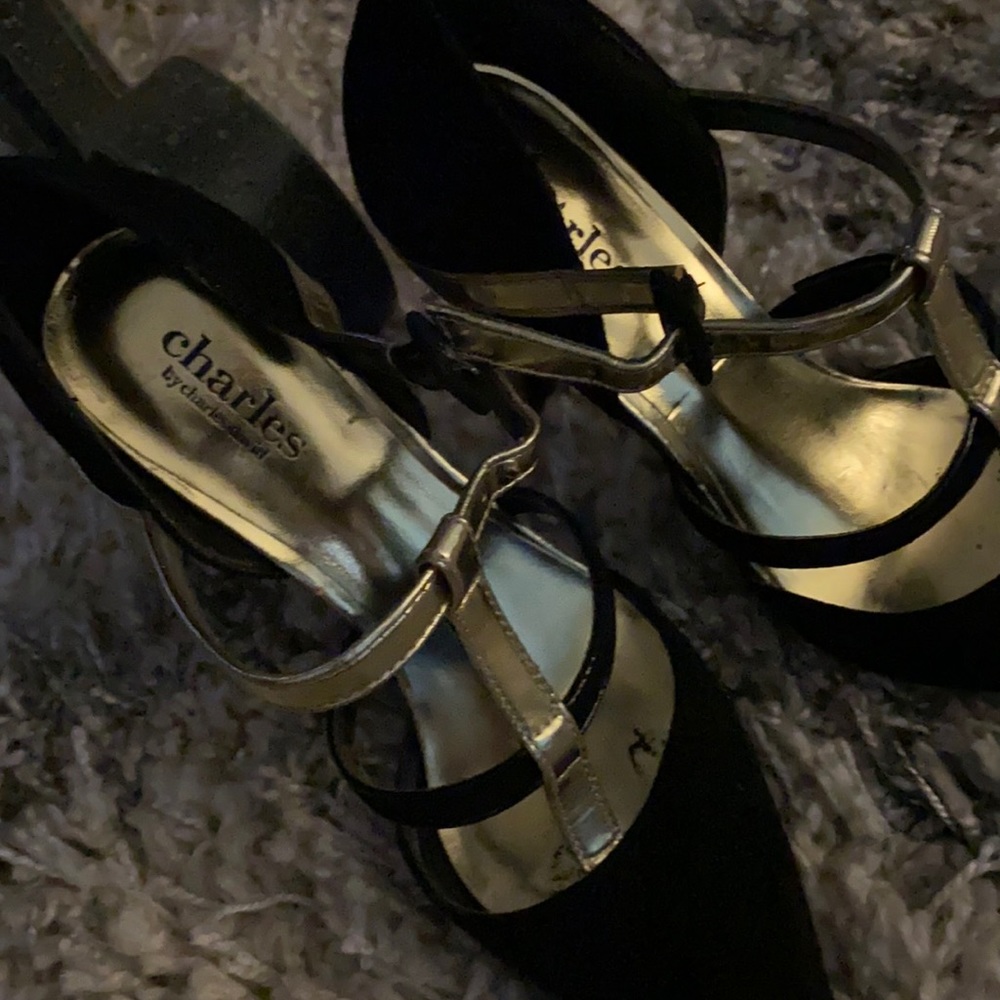 Women’s black and gold heels